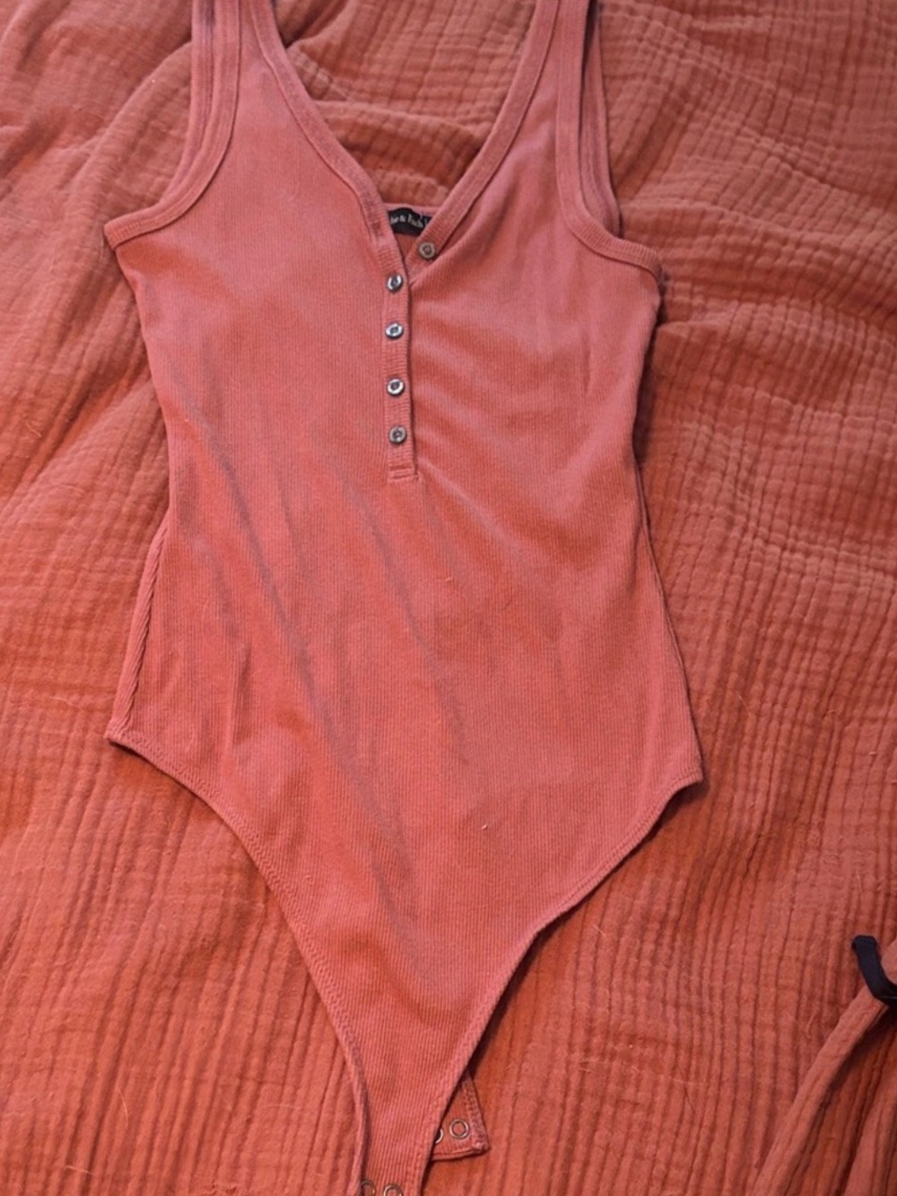 Abercrombie and Fitch women Ribbed Henley One-Piece Bodysuit - Rust Pink